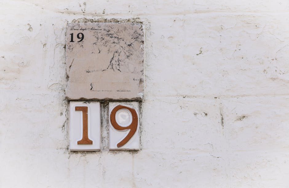 9 : img_7 - Wall tile with number 19 representing our support ticket response efficiency